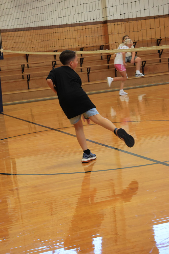 6th graders play dodgeball during Mr. McDonald's P.E. class.