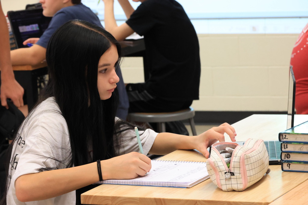 Mrs. Affolter's life science students learn about definitions of protons, neutrons, and electrons.