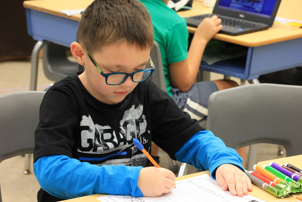 a student works on spelling.