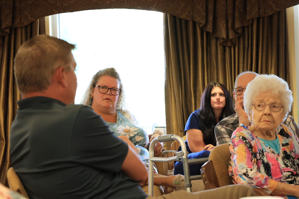 Superintendent Brett Nelson talks with members of the Presbyterian Manor and answers questions about USD 379.