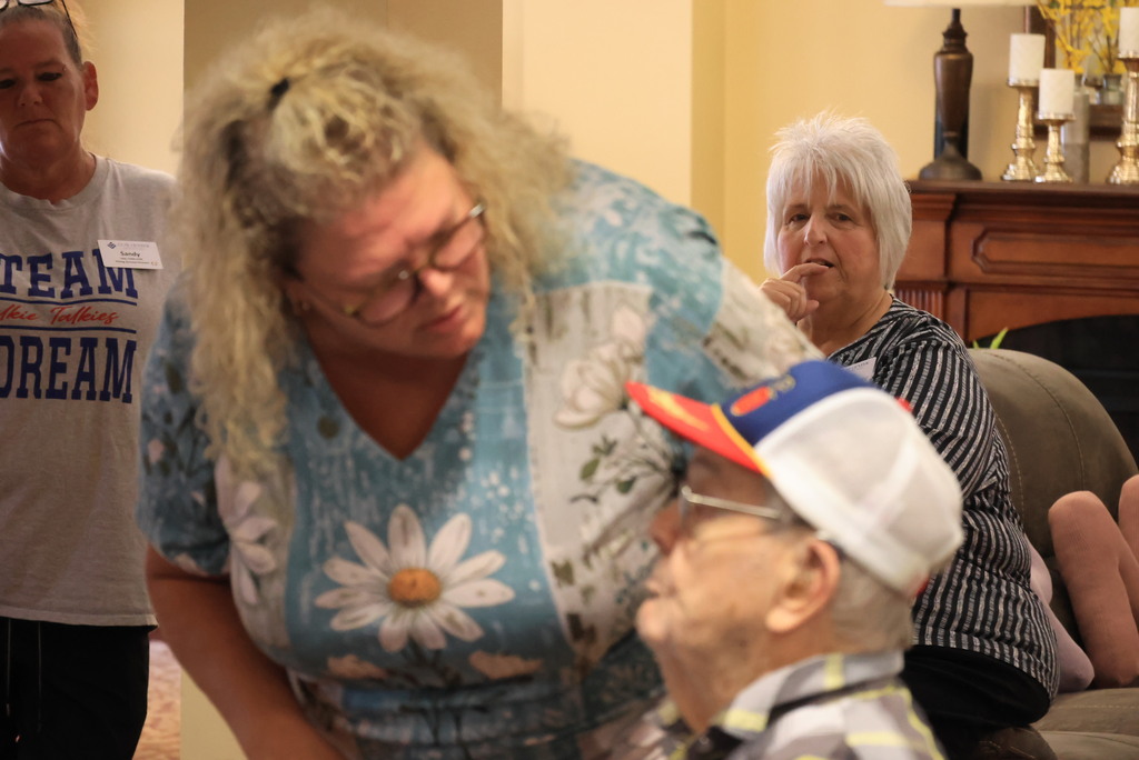 Superintendent Brett Nelson talks with members of the Presbyterian Manor and answers questions about USD 379.