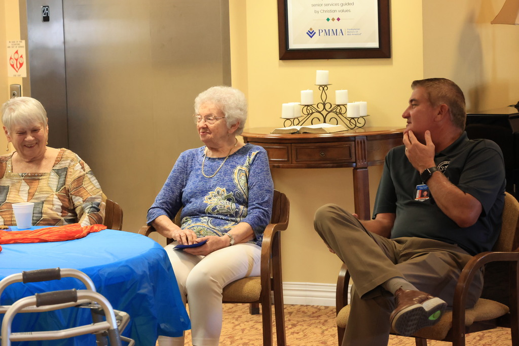 Superintendent Brett Nelson talks with members of the Presbyterian Manor and answers questions about USD 379.