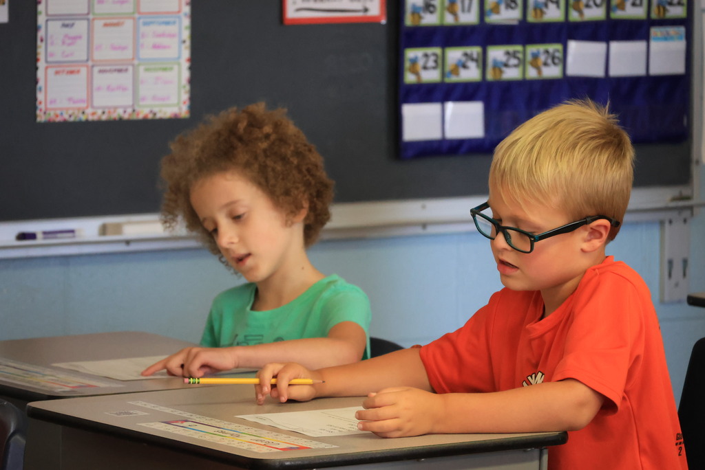 Mrs. Carr's 1st graders read a passage together.