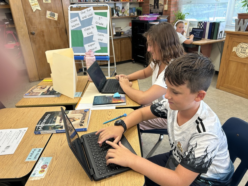 Mr. Yenni's 5th graders work on the online math app i-Ready.