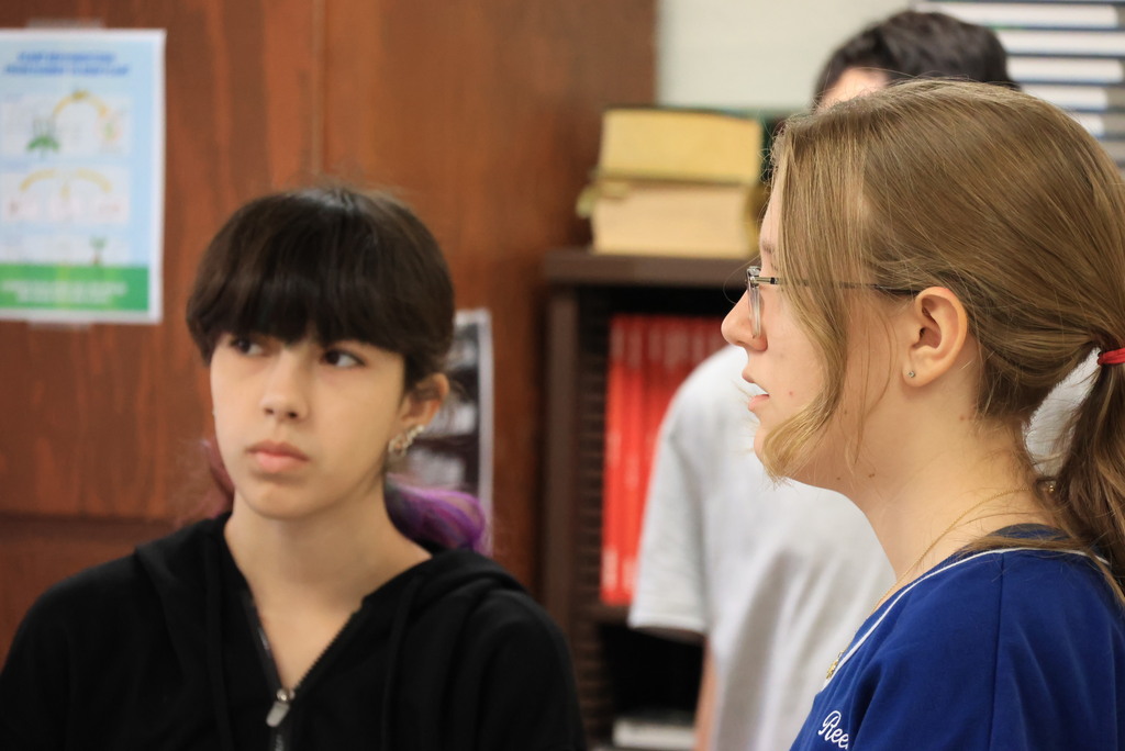 Mrs. Woolever's chemistry students work on a problem converting temperatures from Celcius to Faranheit.
