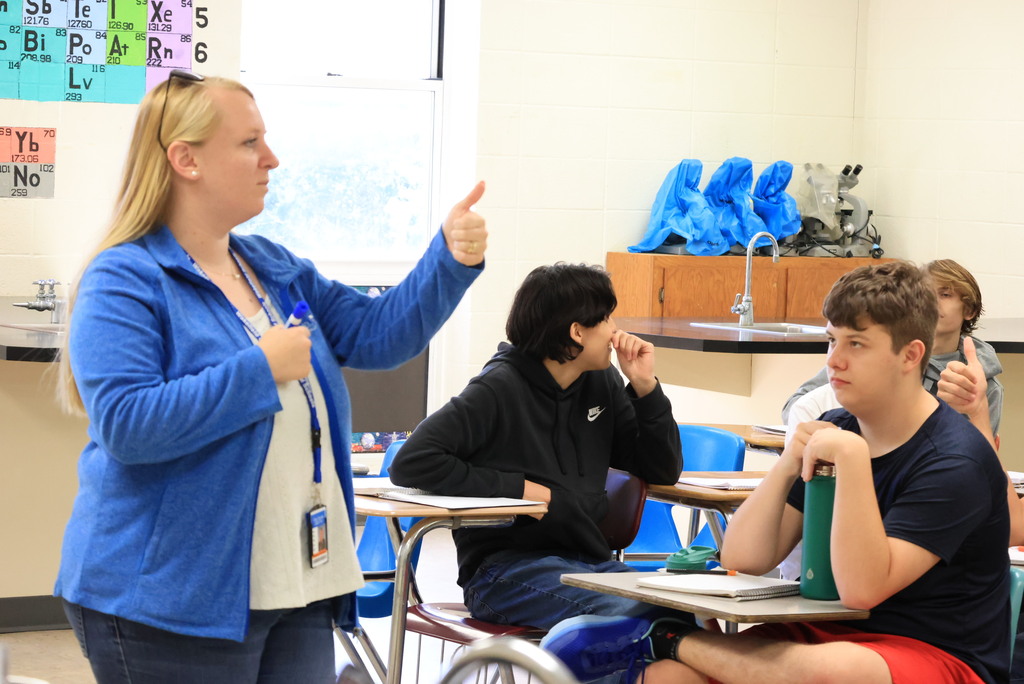 Mrs. Woolever's chemistry students work on a problem converting temperatures from Celcius to Faranheit.