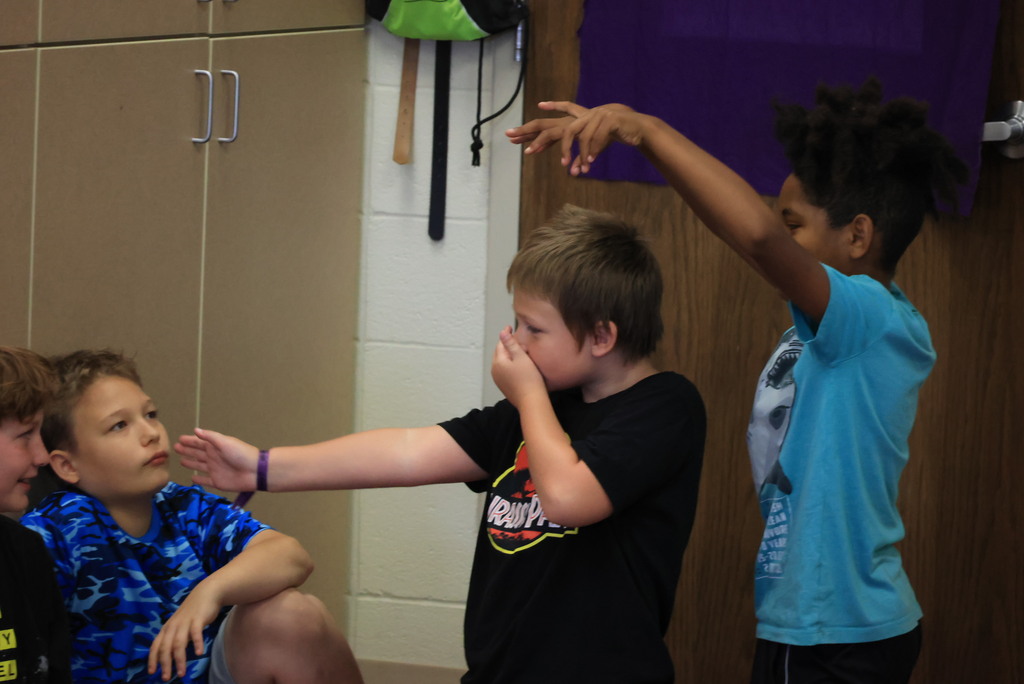 Mrs. Rourke's 5th grade music classes come up with choreograph ideas for the songs they will sing in their upcoming fall concert.