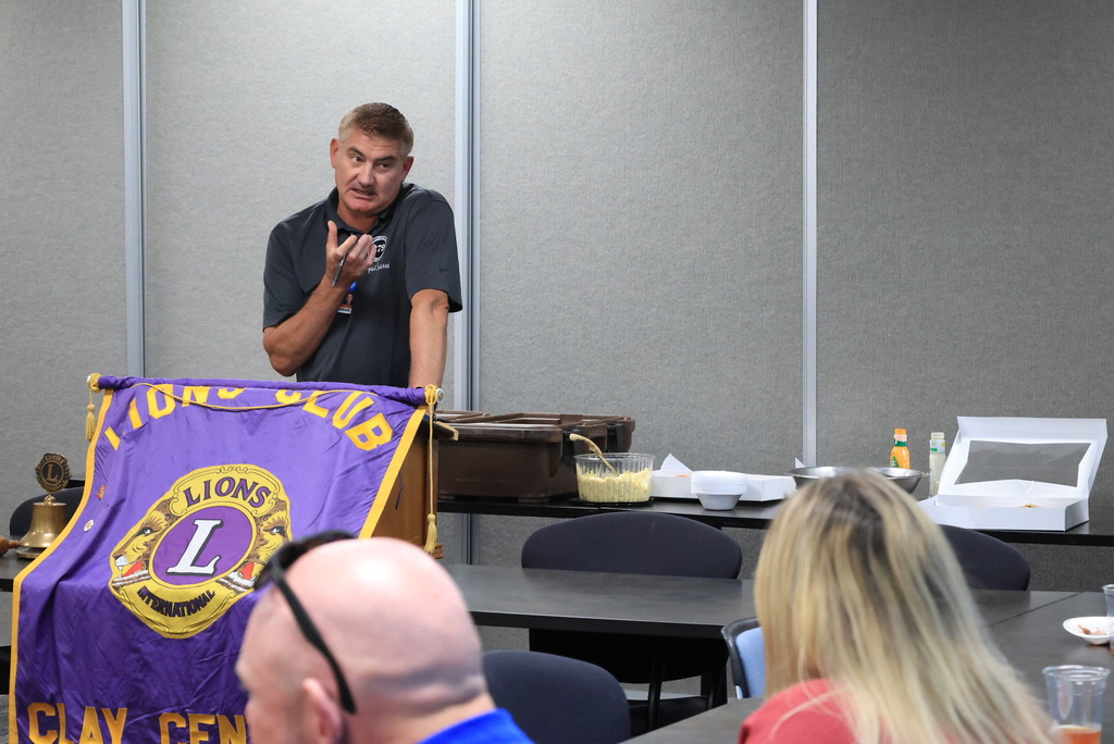 Superintendent Brett Nelson speaks at the Lion's Club meeting today on the timeline for bond money to be utilized and projects to be completed.