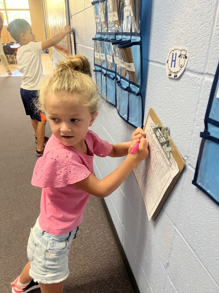 Mrs. Knitter's kidnergarten class practiced recognizing and writing letters with a Bo Peep theme.