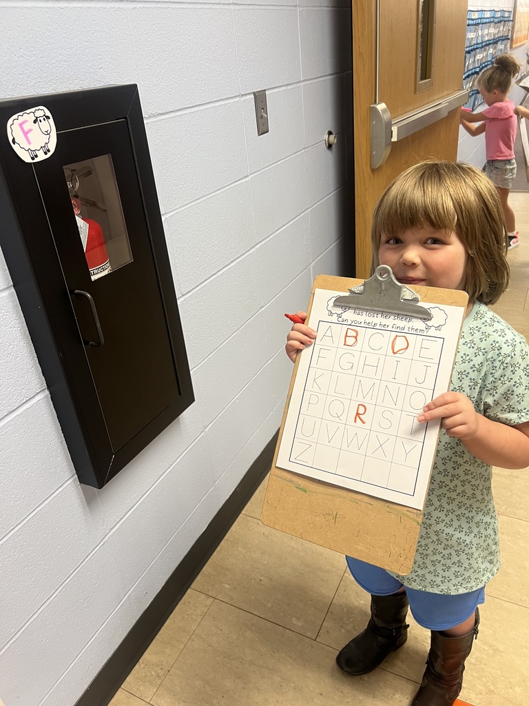 Mrs. Knitter's kidnergarten class practiced recognizing and writing letters with a Bo Peep theme.