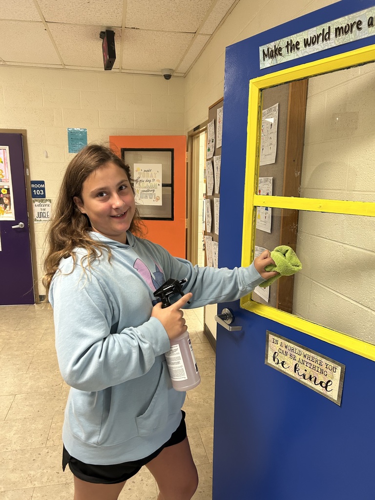 Mr. Yenni's students complete their classroom jobs.