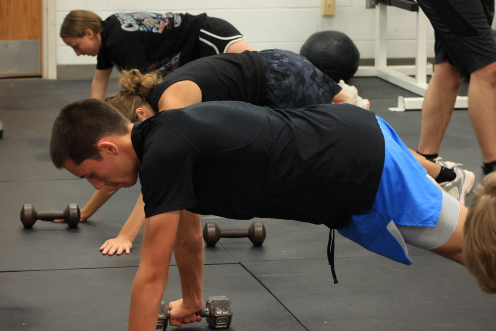 Every Thursday is Mobility Day in Mr. Freeman's strength and conditioning classes. His students are incorporating stretches and flexibility into his workout routine.