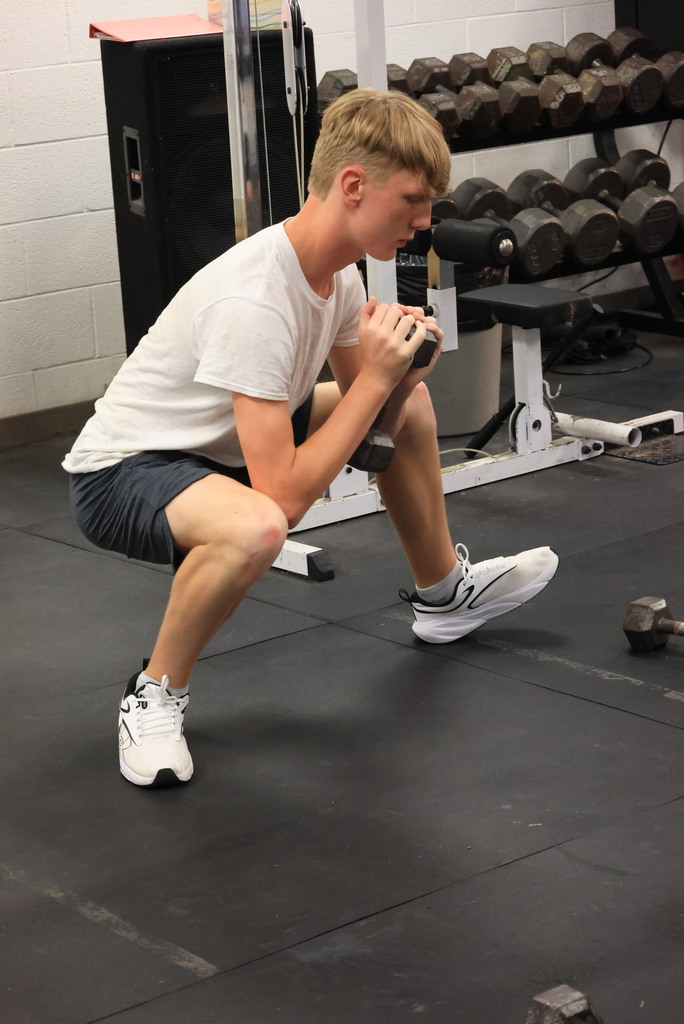 Every Thursday is Mobility Day in Mr. Freeman's strength and conditioning classes. His students are incorporating stretches and flexibility into his workout routine.