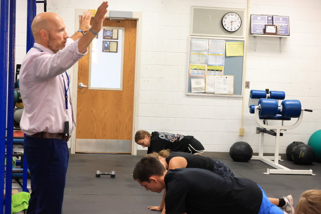 Every Thursday is Mobility Day in Mr. Freeman's strength and conditioning classes. His students are incorporating stretches and flexibility into his workout routine.