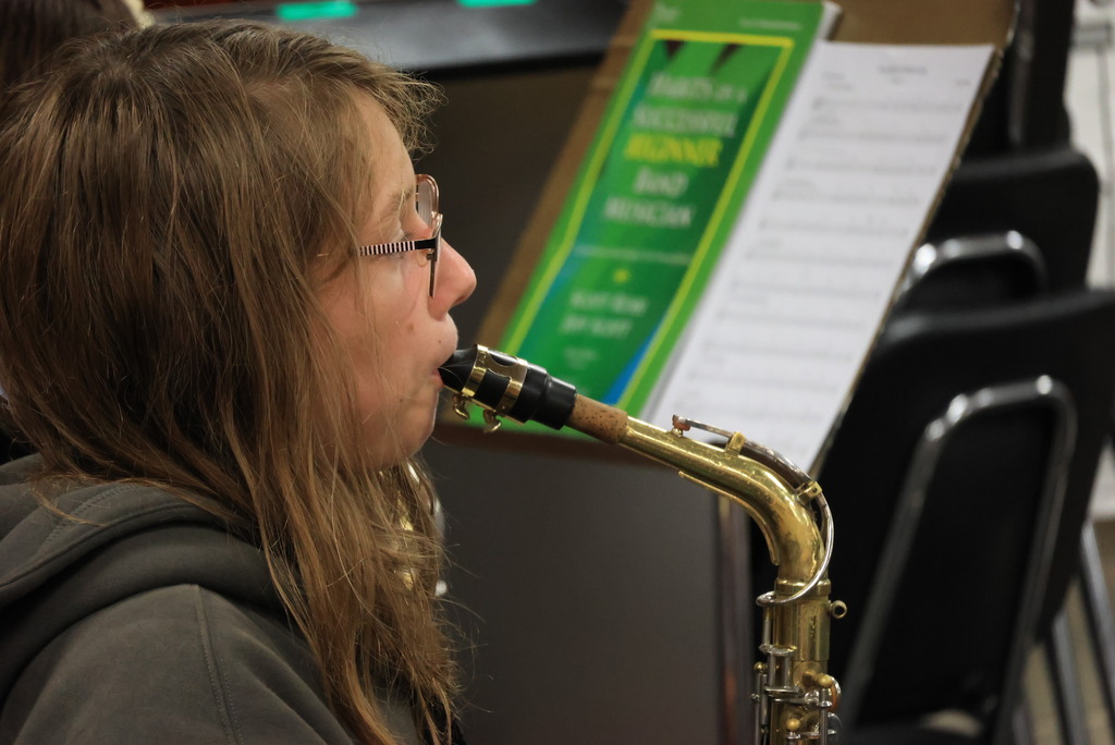 6th grade band students play their warmups to begin class.