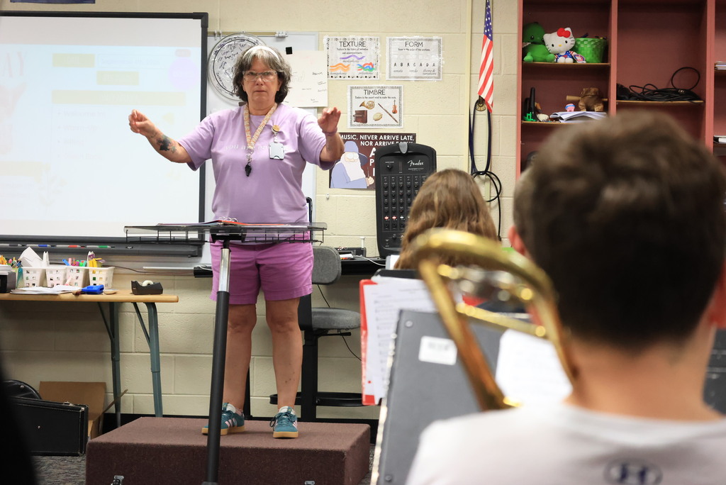 6th grade band students play their warmups to begin class.