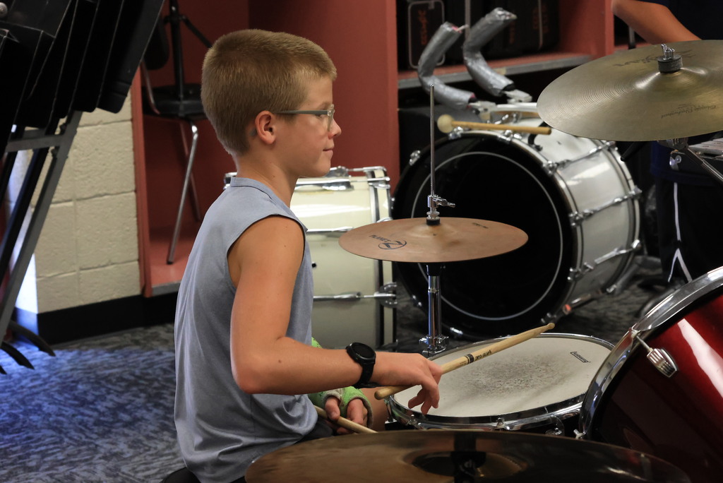 6th grade band students play their warmups to begin class.