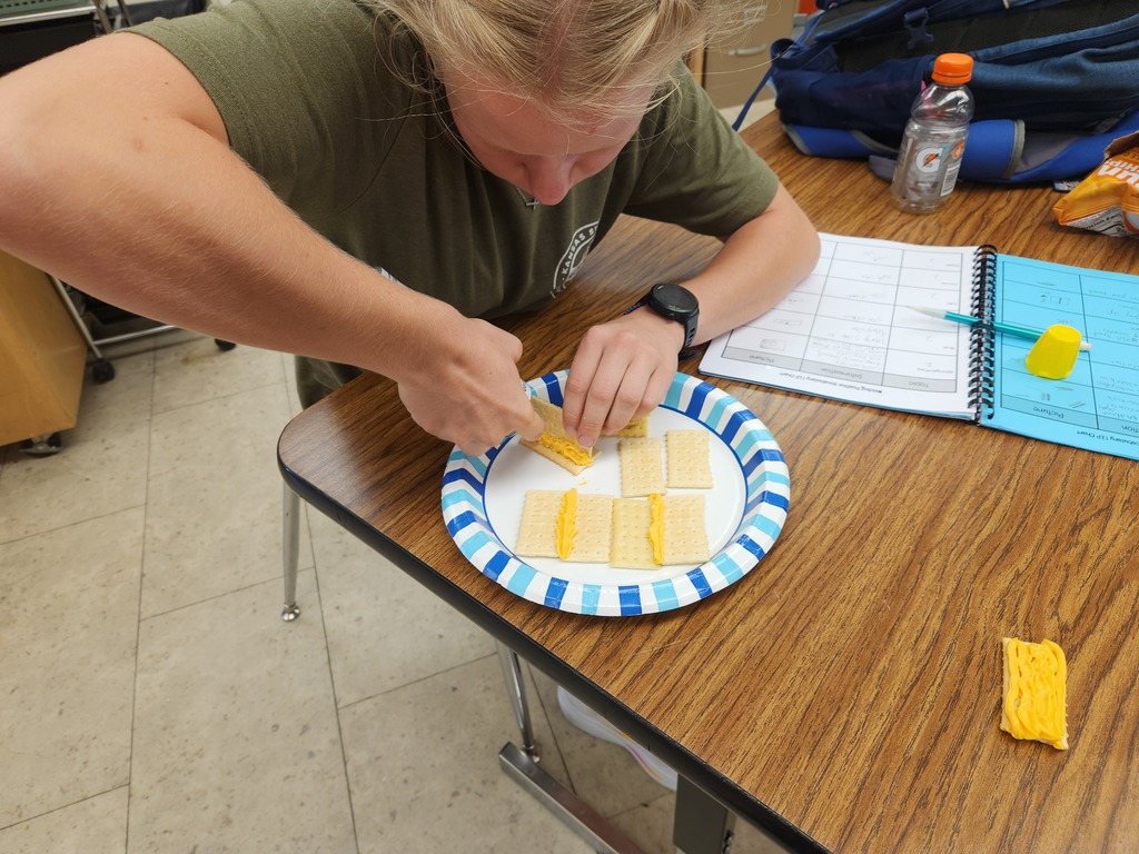 Mrs. Flegler's welding students replicated weld positions using crackers and canned cheese.