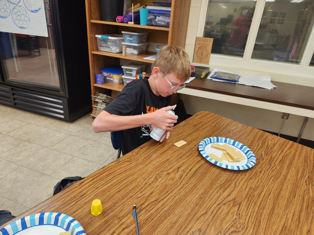 Mrs. Flegler's welding students replicated weld positions using crackers and canned cheese.