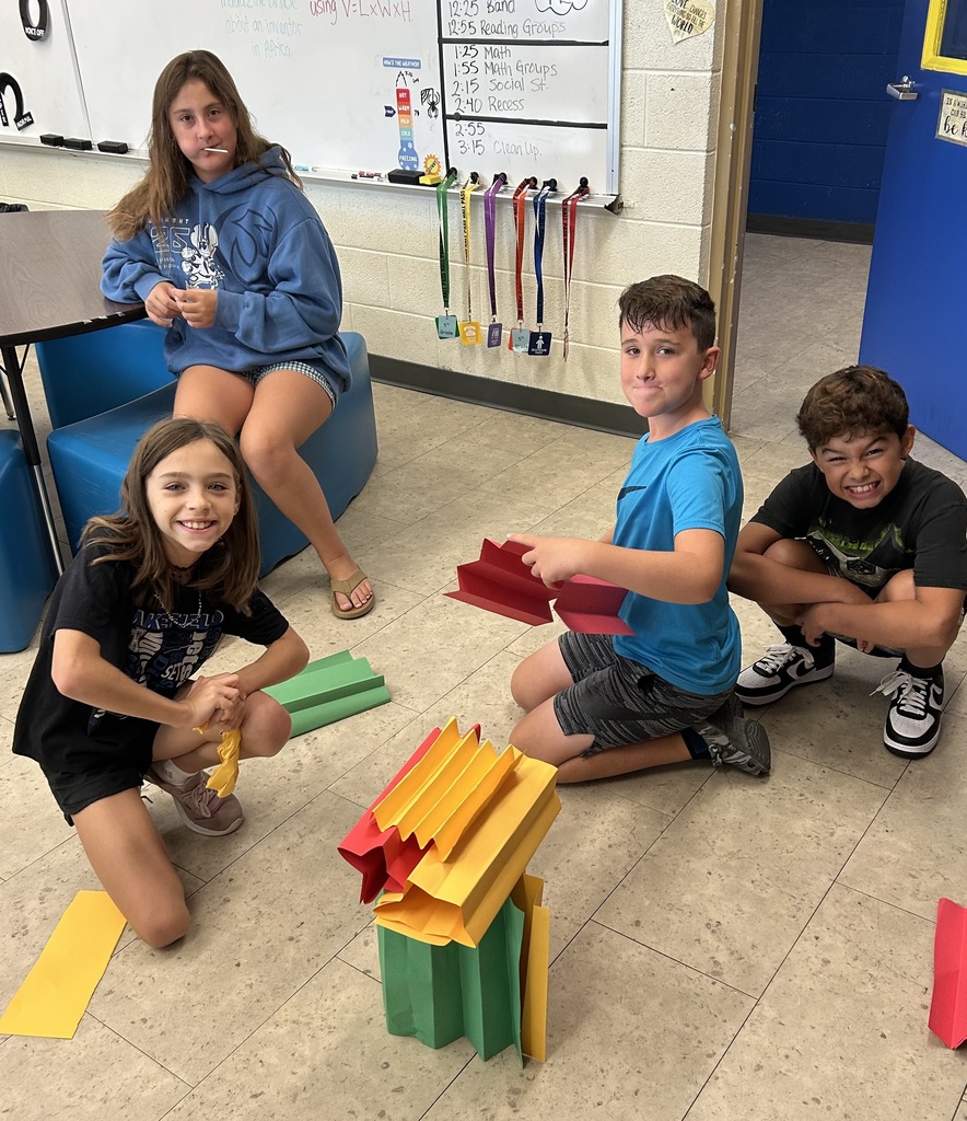 Yesterday, Mr. Yenni's class focused on Habit 6: Synergize of the Leader in Me program.  They worked together as teams in a competition to build the highest tower out of construction paper. 