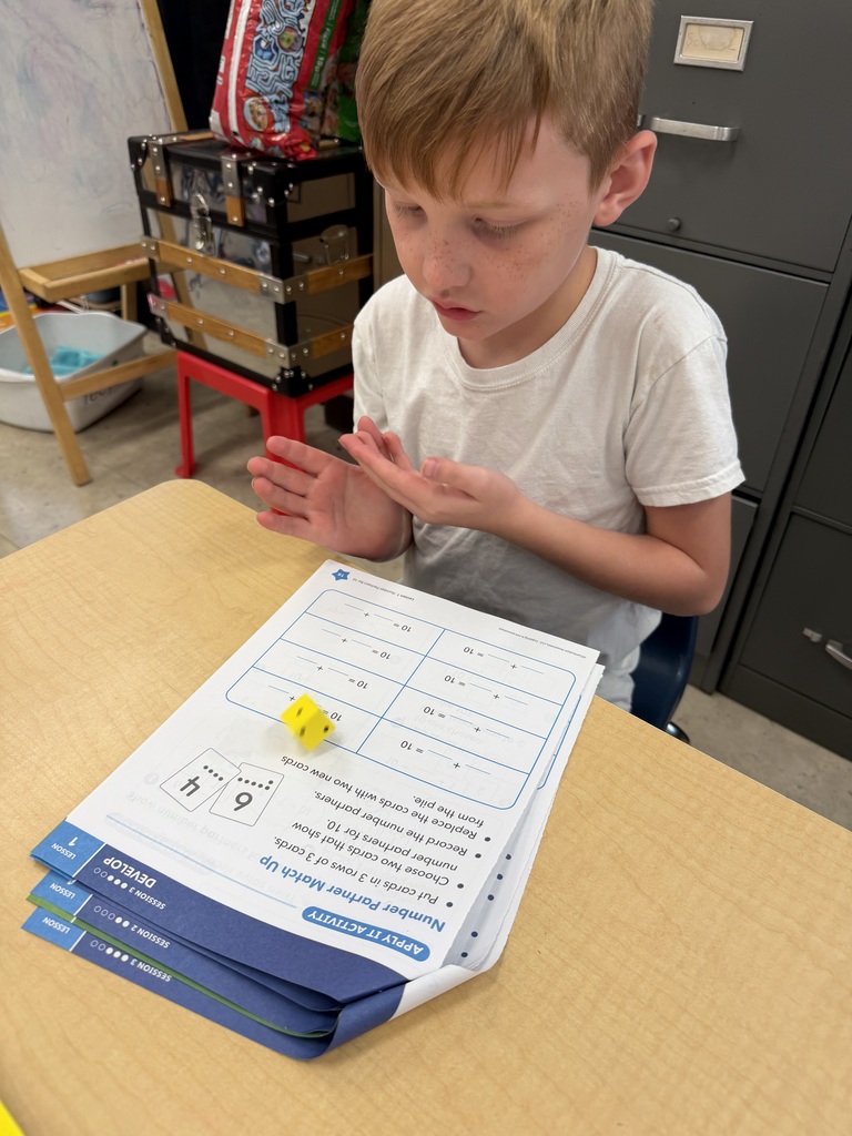 Mrs. Judy's first graders have been busy learning about "Partners to 10" in math class. In this activity, they had fun rolling a die and figuring out how many more they needed to make 10!