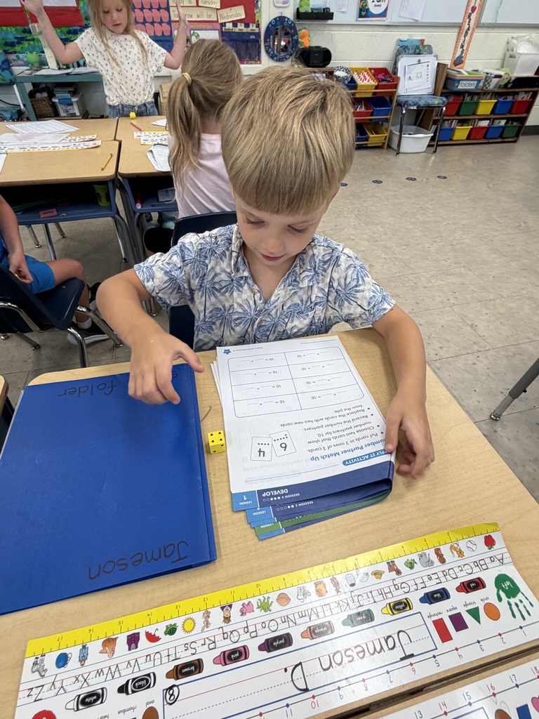 Mrs. Judy's first graders have been busy learning about "Partners to 10" in math class. In this activity, they had fun rolling a die and figuring out how many more they needed to make 10!