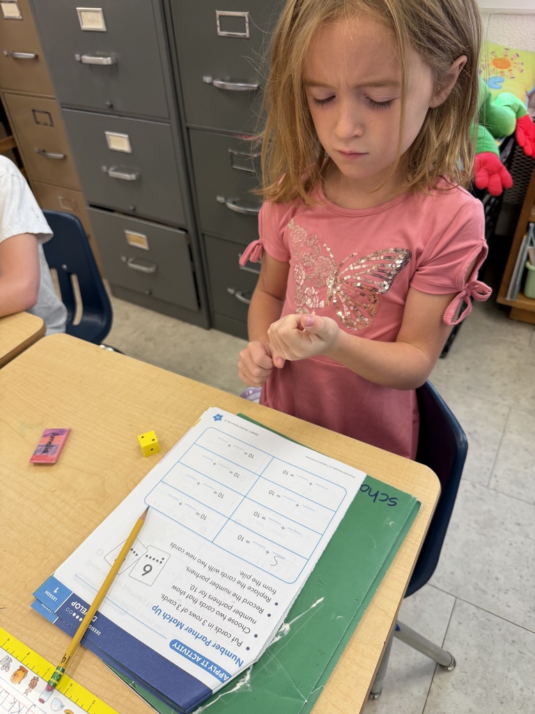 Mrs. Judy's first graders have been busy learning about "Partners to 10" in math class. In this activity, they had fun rolling a die and figuring out how many more they needed to make 10!