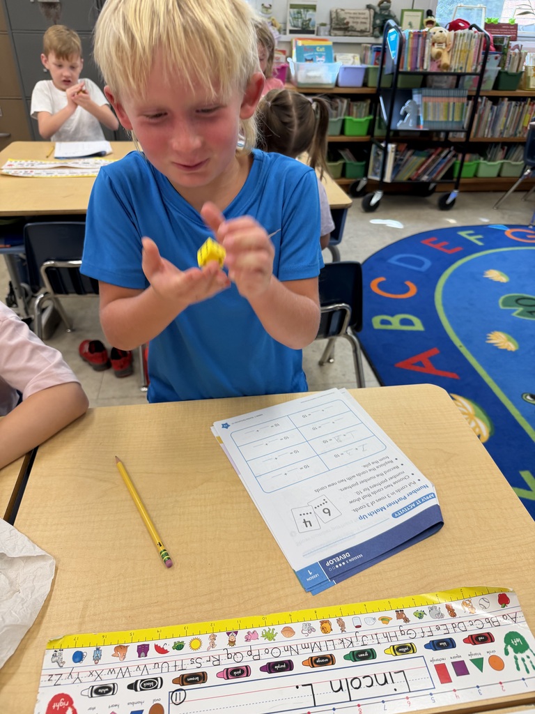 Mrs. Judy's first graders have been busy learning about "Partners to 10" in math class. In this activity, they had fun rolling a die and figuring out how many more they needed to make 10!