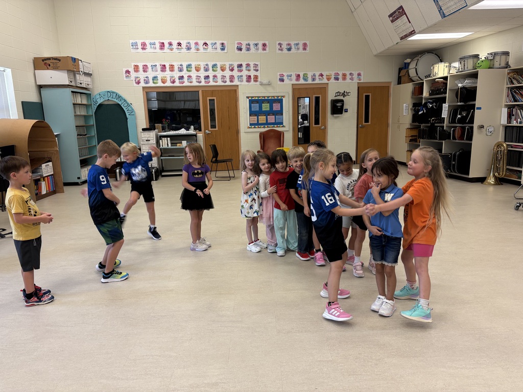 Mrs. Butler's kindergarten and first graders learn dance moves to the song, "London Bridge is Fallying Down".