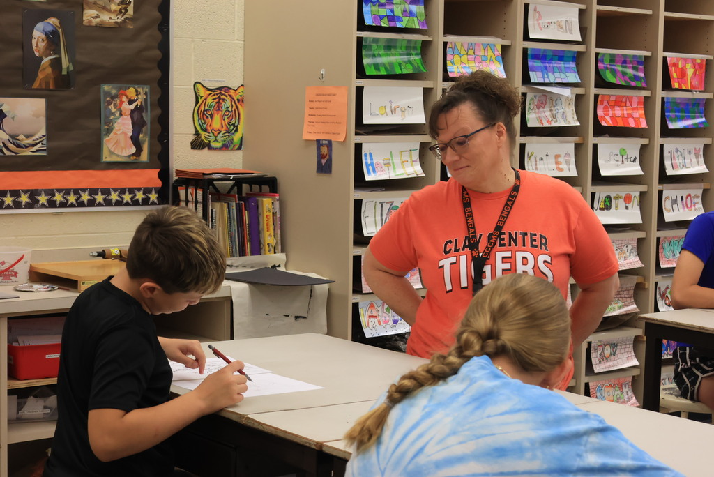 Mrs. Argo's 7th grade art class worked on contour line drawing by recreating a human drawing, only upside down. The goal is to learn to recreate lines rather than the image itself. 