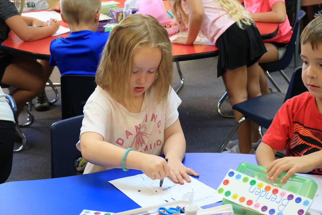 Mrs. Shannon's students draw Mat Man on a piece of paper to learn about body parts and then morph it into a drawing of themselves.