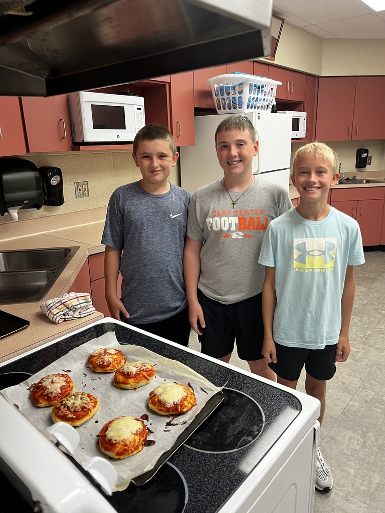 Mini pizzas are a favorite during Mrs. McDonald's Kitchen Safety and Sanitation Unit. They made the pizzas and cleaned up afterward.