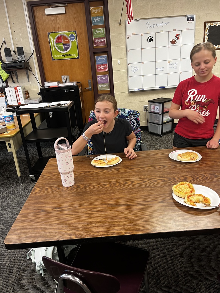 Mini pizzas are a favorite during Mrs. McDonald's Kitchen Safety and Sanitation Unit. They made the pizzas and cleaned up afterward.