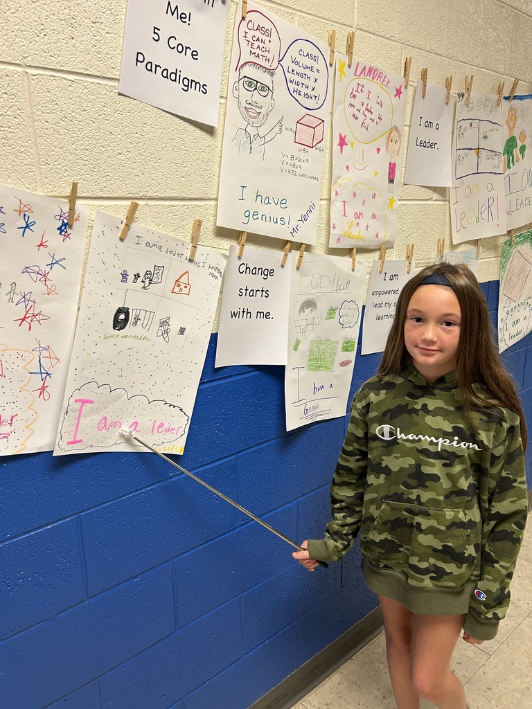 Students are showing posters of Paradigms that challenge them, and explain how they can be proactive in embracing new and better beliefs about themselves.