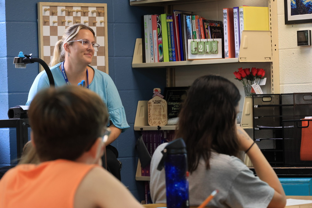 Mrs. Bybee's 7th grade math class was working hard on converting fractions, decimals, and percents today. Individual students came up to the board to solve their problems for the rest of the class.