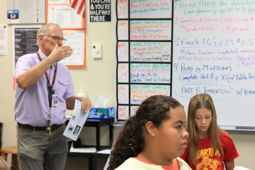Mr. Kalivoda teaches about zebra mussels and their origins to his 7th grade science class.