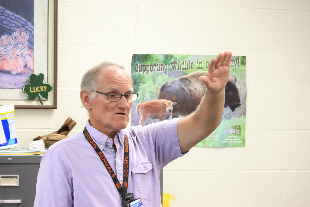 Mr. Kalivoda teaches about zebra mussels and their origins to his 7th grade science class.