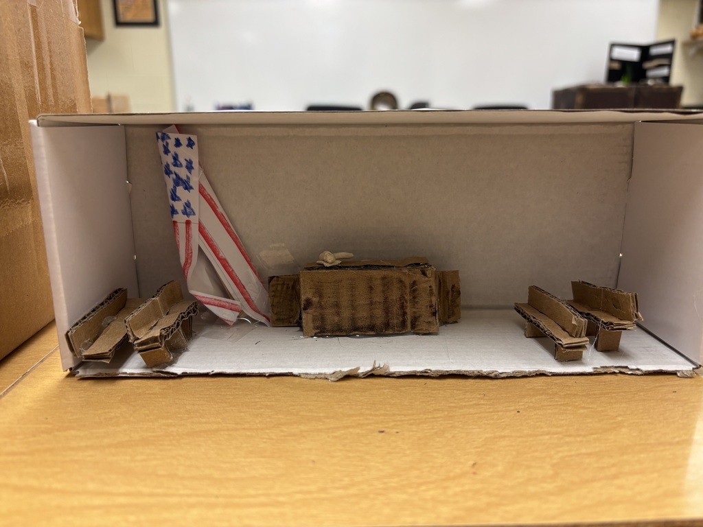Mr. Kindel is a student teacher under social studies teacher Mr. Lane. He has been teaching the 8th graders about the writing of the constitution, the three branches of government, and the protections under the bill of rights. As a final project, he had the students create a model of one of the three branches of government to explain and demonstrate their understanding of the division of powers.