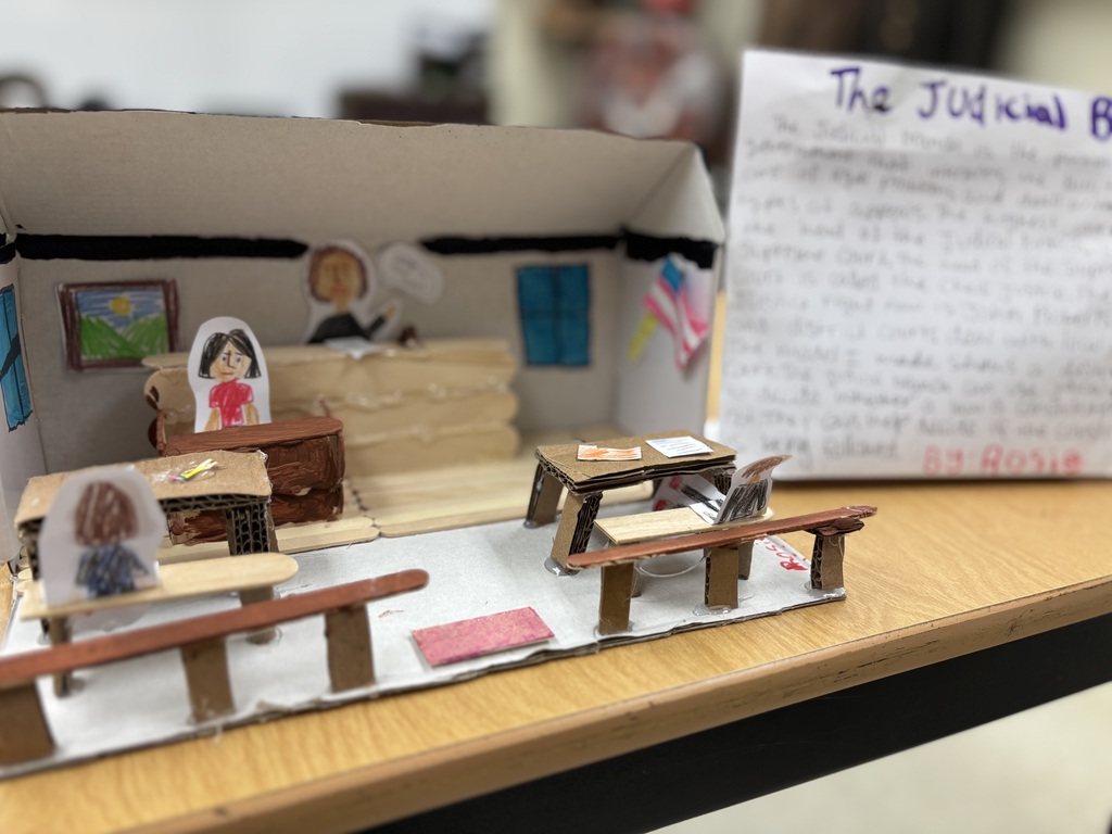 Mr. Kindel is a student teacher under social studies teacher Mr. Lane. He has been teaching the 8th graders about the writing of the constitution, the three branches of government, and the protections under the bill of rights. As a final project, he had the students create a model of one of the three branches of government to explain and demonstrate their understanding of the division of powers.