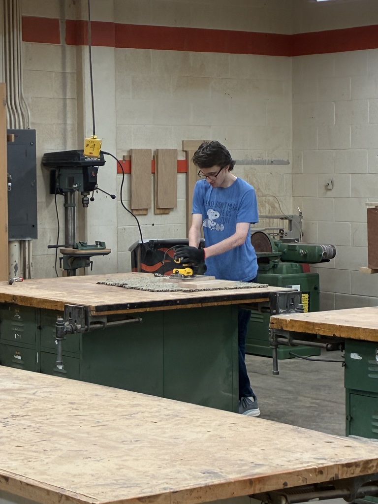 Earlier in the year, Mrs. Schooley's Cabinetmaking students worked with the Green Community Cafe to create a holder for their napkins, menus, salt and pepper shakers, and sugar containers. Last week, they started production!