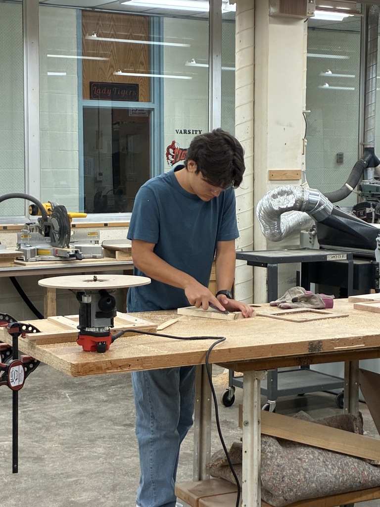 Earlier in the year, Mrs. Schooley's Cabinetmaking students worked with the Green Community Cafe to create a holder for their napkins, menus, salt and pepper shakers, and sugar containers. Last week, they started production!