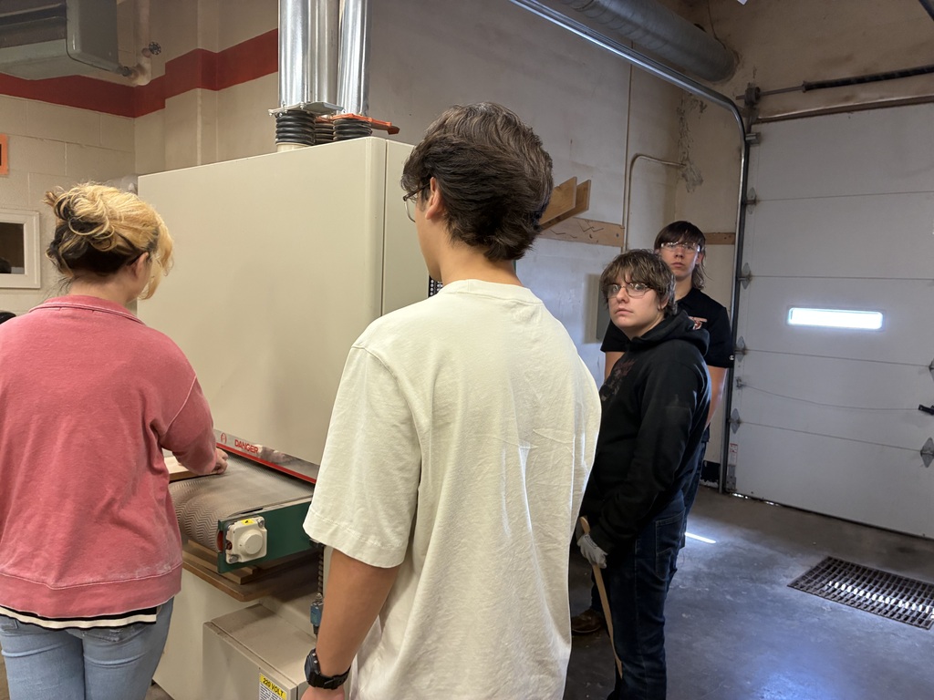 Earlier in the year, Mrs. Schooley's Cabinetmaking students worked with the Green Community Cafe to create a holder for their napkins, menus, salt and pepper shakers, and sugar containers. Last week, they started production!