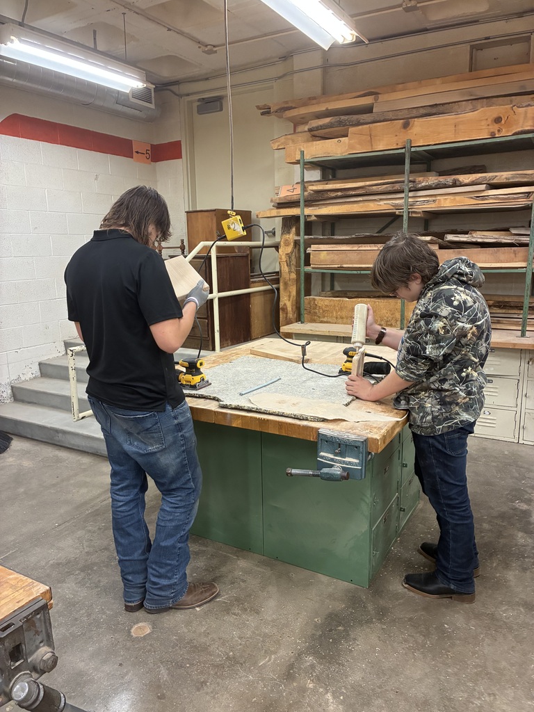 Earlier in the year, Mrs. Schooley's Cabinetmaking students worked with the Green Community Cafe to create a holder for their napkins, menus, salt and pepper shakers, and sugar containers. Last week, they started production!