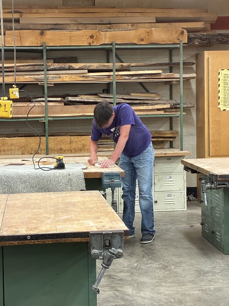Earlier in the year, Mrs. Schooley's Cabinetmaking students worked with the Green Community Cafe to create a holder for their napkins, menus, salt and pepper shakers, and sugar containers. Last week, they started production!