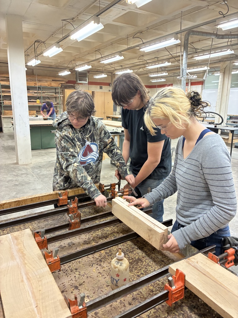 Earlier in the year, Mrs. Schooley's Cabinetmaking students worked with the Green Community Cafe to create a holder for their napkins, menus, salt and pepper shakers, and sugar containers. Last week, they started production!