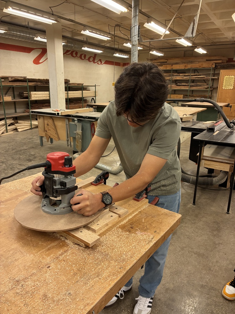 Earlier in the year, Mrs. Schooley's Cabinetmaking students worked with the Green Community Cafe to create a holder for their napkins, menus, salt and pepper shakers, and sugar containers. Last week, they started production!