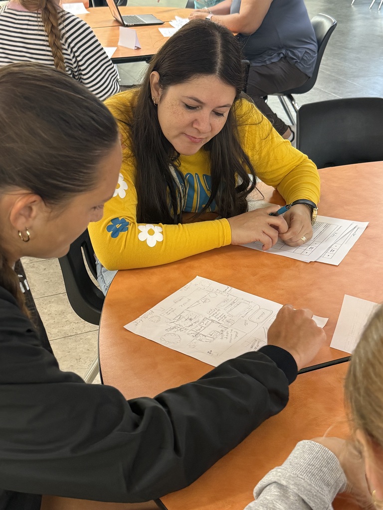 Mrs. Hughes' Spanish students have been working on house vocabulary and making comparisons. Last week, a group of native speakers from the community were invited in to describe a house they wanted built. Students "architects" then created and presented a design and argued why it was better than their classmates' designs.