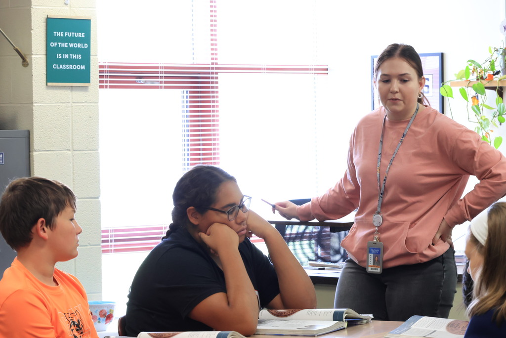 Mrs. Mellies' 7th grade social studies students partner read about the process of Kansas officially becoming a state.