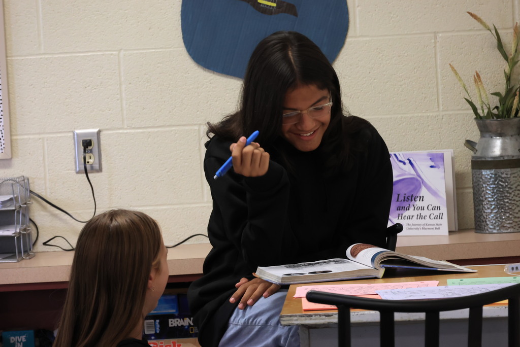 Mrs. Mellies' 7th grade social studies students partner read about the process of Kansas officially becoming a state.