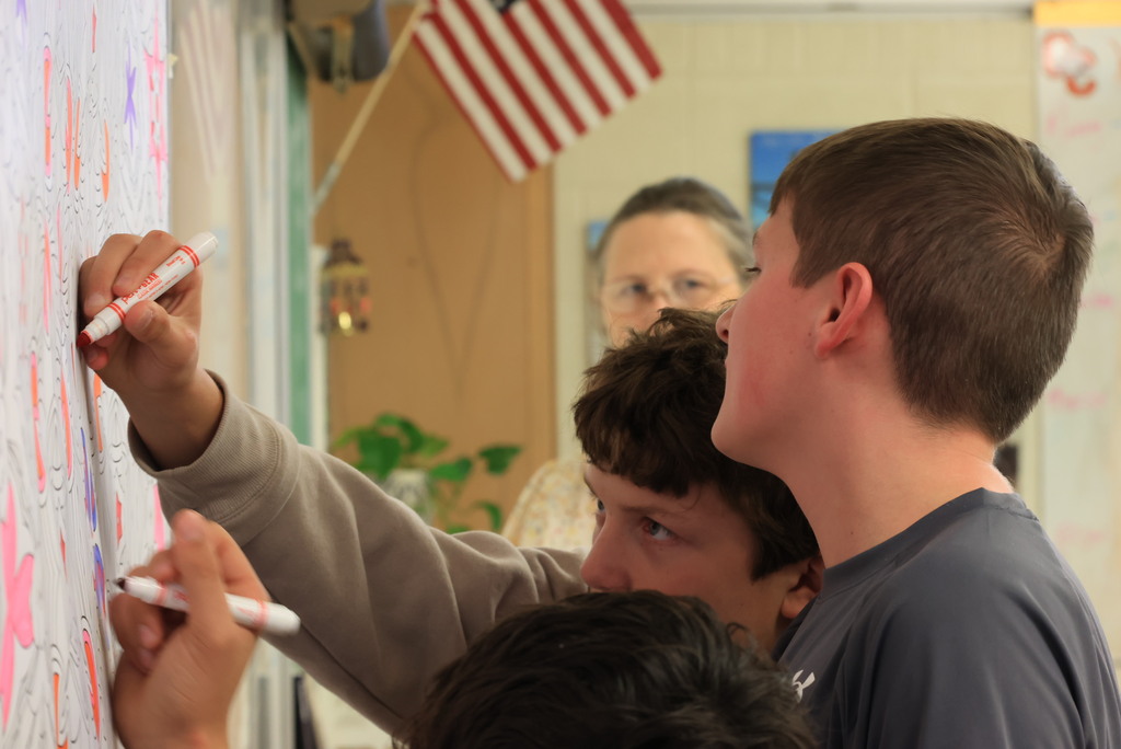 Ms. TenClay's World History students create their own art while learning about the differences between the two.